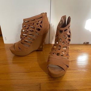 Never worn wedge heels